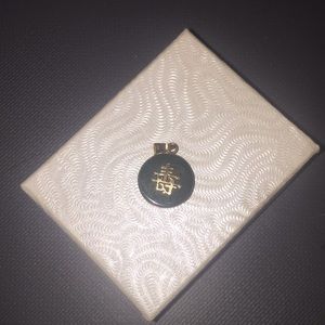 Jade and 14k pendant